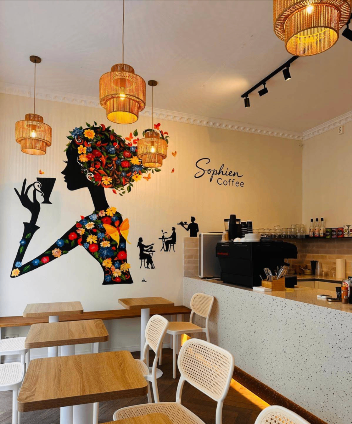 Inside Sophien Coffee with the signature floral mural